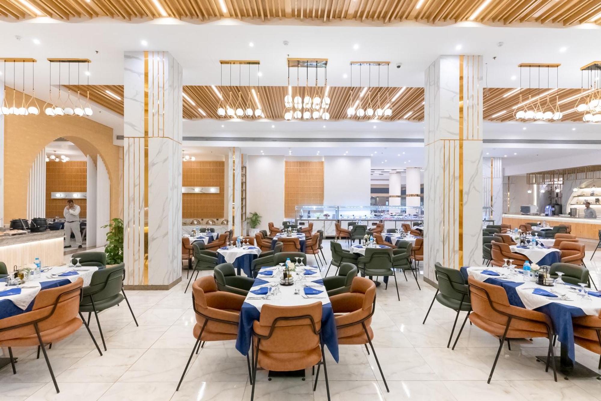 The V Luxury Resort Sahl Hasheesh Hurghada Bagian luar foto The restaurant