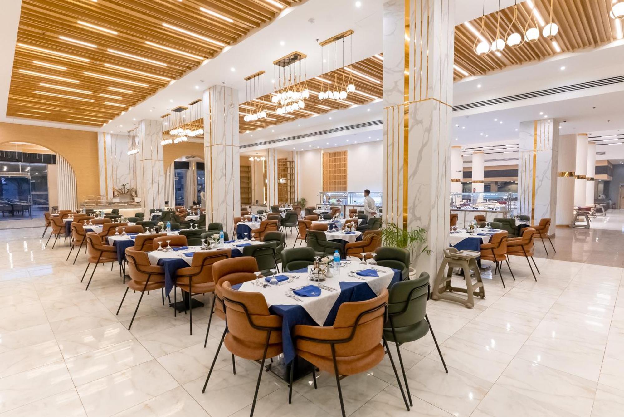 The V Luxury Resort Sahl Hasheesh Hurghada Bagian luar foto The restaurant