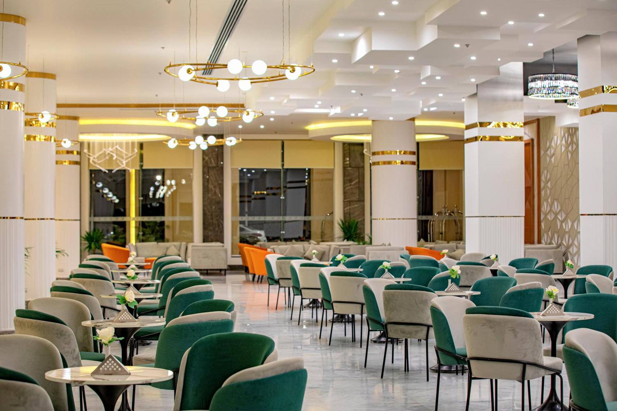 The V Luxury Resort Sahl Hasheesh Hurghada Bagian luar foto The interior of the restaurant