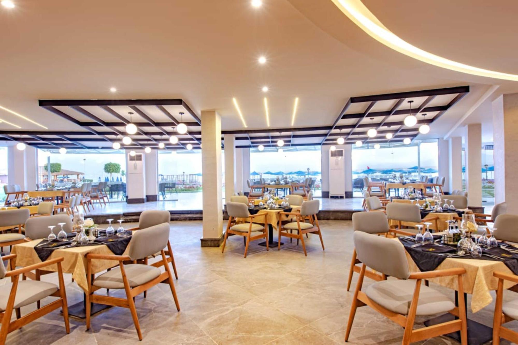 The V Luxury Resort Sahl Hasheesh Hurghada Bagian luar foto Restaurant